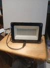 Onforu 100W IP66 Red Led Flood Light. Fixed Price $19.99.