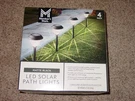 Members Mark Solar Black Outdoor Integrated Led Landscape Pathway Lights 4 Pack. Fixed Price $59.95.