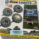 4 Pack Solar Pathway Disk Lights Ultra Led With Stakes Bell Howell Nib. Fixed Price $12.60.