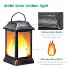Tomcare Solar Lights Metal Flickering Flame Lantern Outdoor Hanging. Fixed Price $66.36.