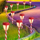10PACK Solar Christmas Garden Lights, Outdoor Powered Candy Cane Pat. Fixed Price $63.99.