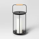 10.5" Metal And Glass Battery Led Outdoor Lantern Clear/black - Threshold. Fixed Price $28.89.