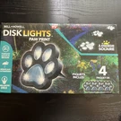 Bell + Howell Paw Print Solar Disk Lights 4-PACK, 6 Leds, Weather-resistant. Fixed Price $29.73.