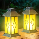 Anyperfect 2PACK Patina 13 Metal Glass Solar Lantern Flickering Flame Outdoor. Fixed Price $74.45.