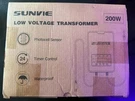 Sunvie 200W Landscape Lighting Transformer Low Voltage LVT-MT200-1214AC. Fixed Price $49.99.