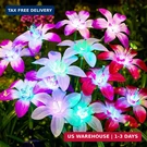 Ahaorigin Solar Garden Lights Outdoor, 4 Pack Blooming Lily Flowers. Fixed Price $54.35.