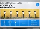 Room Essentials 6PK Round Solar Led Outdoor Path Lights Matte Black. Fixed Price $29.99.