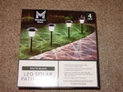 Members Mark Solar Black Outdoor Integrated Led Landscape Pathway Lights 4 Pack. Fixed Price $59.95.
