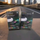 Bell + Howell 4-PACK Pathway Disk Color Changing Solar Lights New Sealed. Fixed Price $39.99.