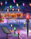 Freecube 50FT C9 Led Solar Christmas Pathway Lights Outdoor, 25 Multicolor Bulbs. Fixed Price $65.99.