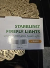Starburst Firefly Lights Solar Pathway 4 Pack Warm White Outdoor Black. Fixed Price $26.00.