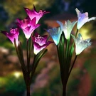 Outdoor Garden Stake Lights 2 Pack Solarmart Powered With 8 Lily Flower. Fixed Price $59.99.