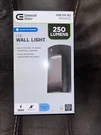 Commercial Electric 40-WATT Equivalent Integrated Led Bronze Security Down Ligh. Fixed Price $10.00.