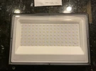 Olafus 100W Led Outdoor, 9000LM Outside Floodlight, IP66 Wa. Fixed Price $39.99.