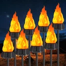 Flickering Flame Solar Torch Lights - 8 Pack Waterproof Outdoor Decor. Fixed Price $110.99.