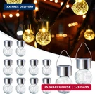 Gigalumi Solar Lights Outdoor Waterproof, 12 Pack Hanging Garden. Fixed Price $37.48.