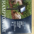Hampton Bay 900 Lumen Plug-in Black Integrated Led Outdoor Landscape Flood Light. Fixed Price $34.99.