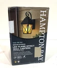 Hampton Bay 1-LIGHT Midnight Black Led Outdoor Flicker Flame Lantern Sconce. Fixed Price $69.99.