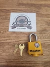 Master 315KA Covered Outdoor Padlock With 2 Keys, 3/4" Shackle, Yellow. Fixed Price $13.99.