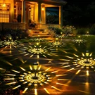 Gigalumi 12 Pack Solar Outdoor Waterproof, Warm White Pathway Lights. Fixed Price $60.68.