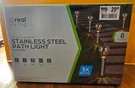 Real Living Led Solar Powered Stainless Steel Path Light Rechargeable 8 Count. Fixed Price $16.00.
