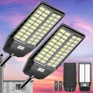 8000W Large Solar Street Light Dusk To Down Motion Sensor Remote 2 Pack 1779. Fixed Price $168.00.