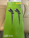 New Commercial Electric 2-PACK Led Spike Lights, W/ Adj. Heads, 550 Lumens. Fixed Price $10.00.