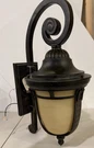 Hinkley Key West Outdoor Wall Sconce Bronze, Antiqued Vanilla Glass Lantern. Fixed Price $75.00.